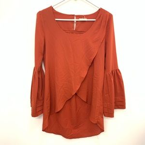 Love Riche rust orange dress bell sleeves high low